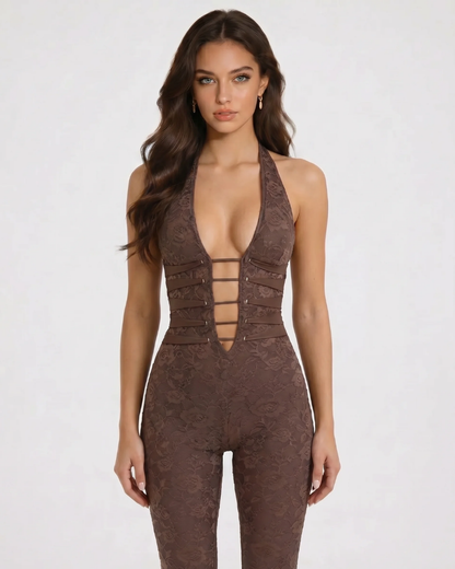 Close-up of brown corset jumpsuit showing halter neckline, lace fabric, and front strap cutouts