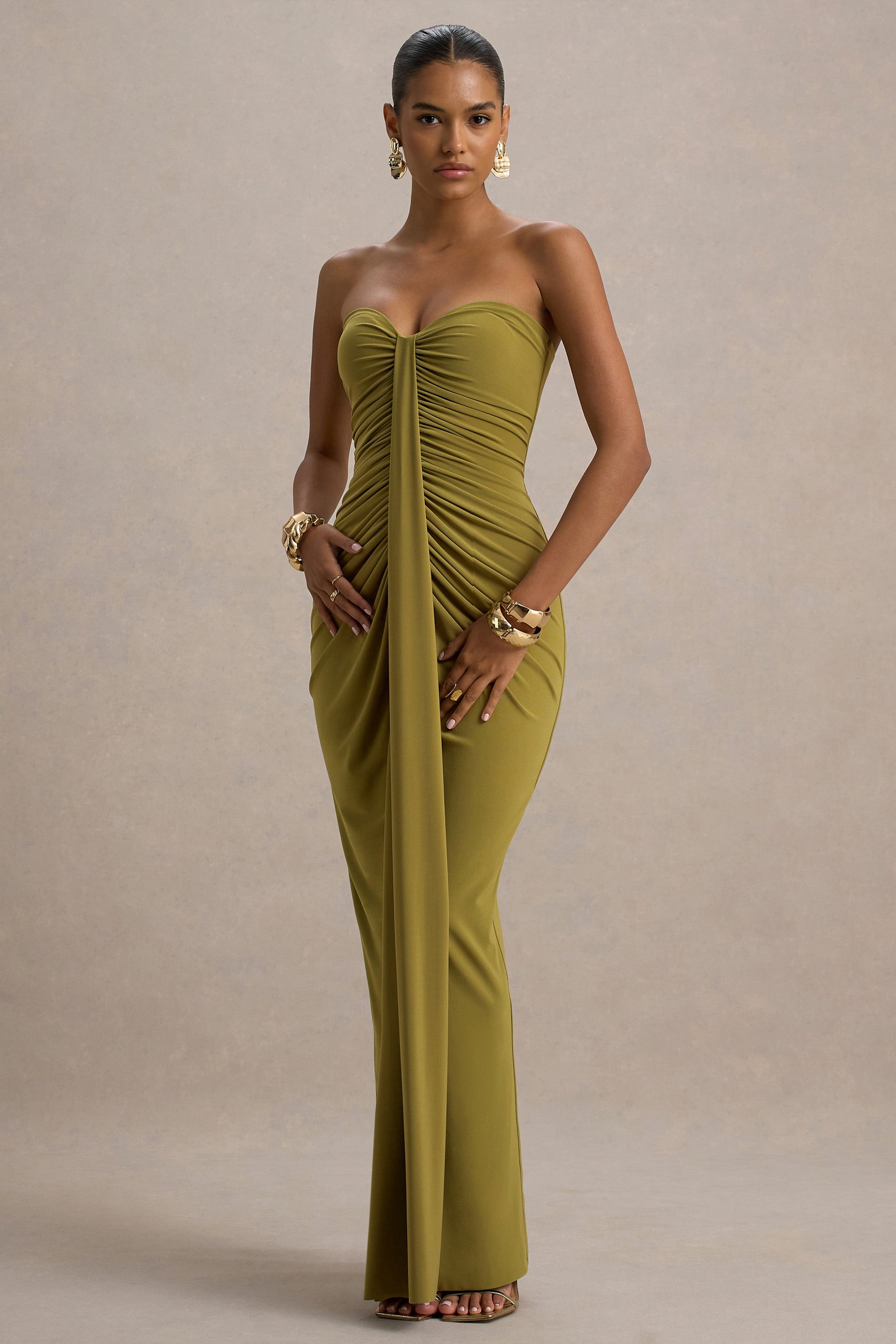 Front view of an olive green strapless ruched maxi dress, highlighting the elegant fit and floor-length style.