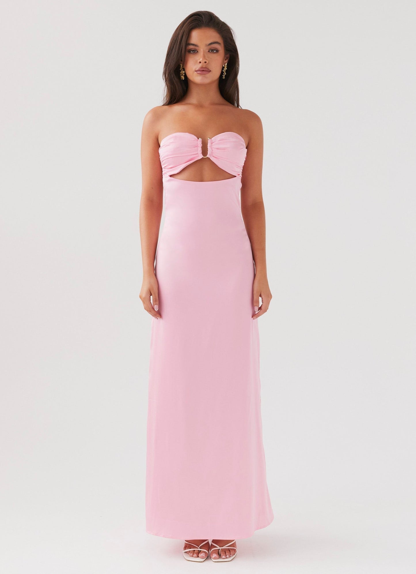 Lyra Floral Maxi Dress in solid light pink, strapless with a ruched bust and front cutout detail.