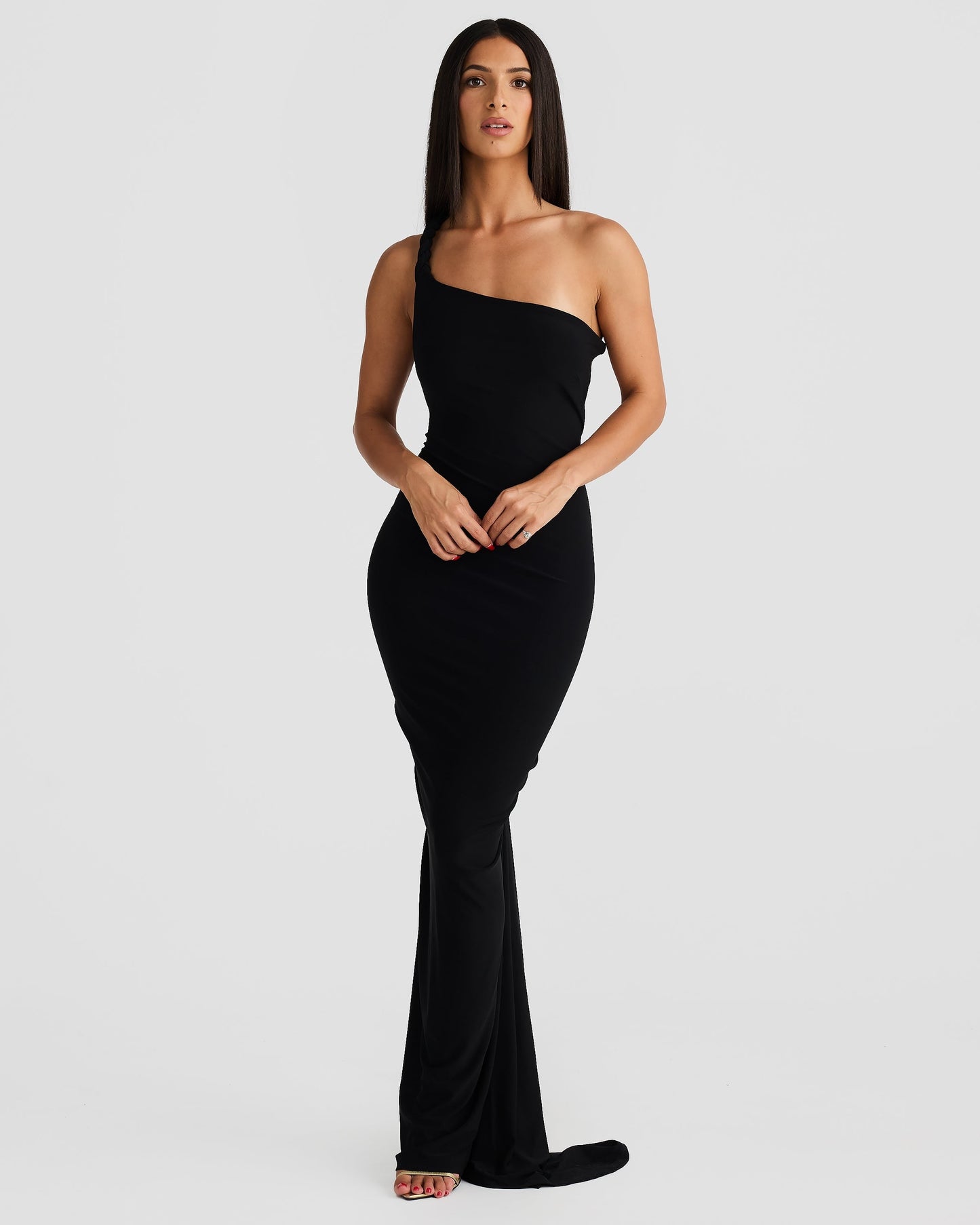 Front view of the black Paulina maxi dress, featuring a chic one-shoulder design and elegant floor-length hem.