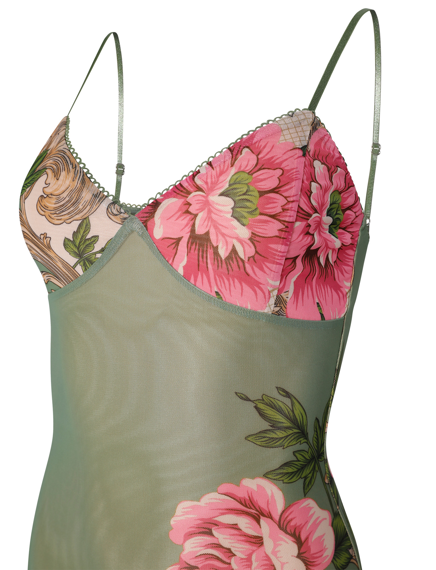 Detailed close-up of the bust of the green floral mesh maxi dress, showing the pink floral print and delicate trim.