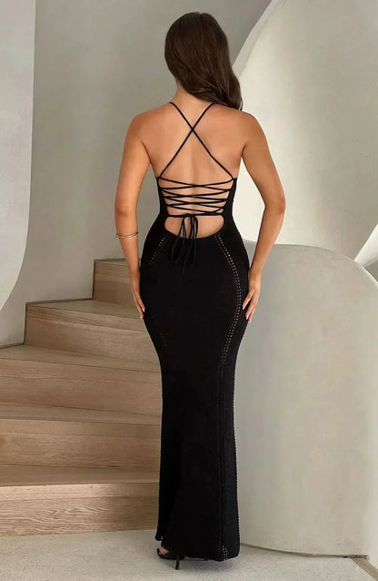 Black crochet corset maxi dress — back view with lace-up detail and floor-length silhouette